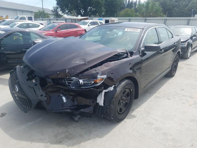 Photo 1 VIN: 1FAHP2L89JG120180 - FORD TAURUS POL 