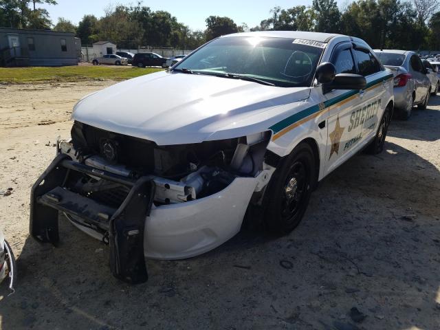 Photo 1 VIN: 1FAHP2M89DG213025 - FORD TAURUS POL 