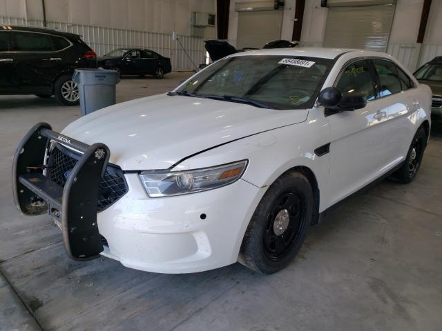 Photo 1 VIN: 1FAHP2M8XDG124760 - FORD TAURUS POL 