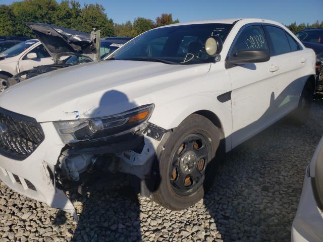 Photo 1 VIN: 1FAHP2MK0GG104386 - FORD TAURUS POL 