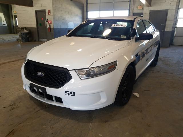 Photo 1 VIN: 1FAHP2MKXEG107048 - FORD TAURUS POL 