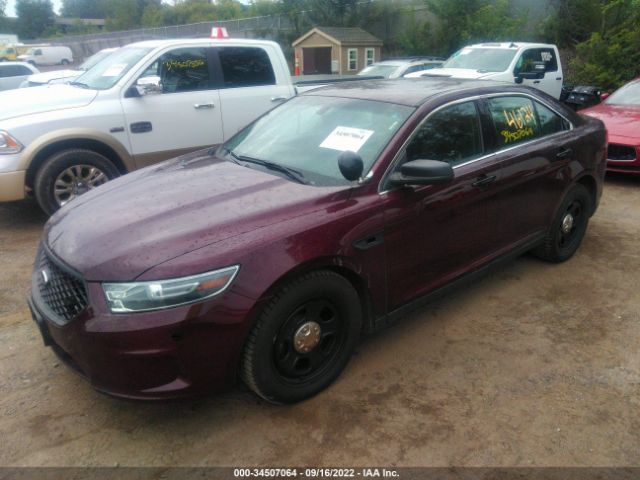 Photo 1 VIN: 1FAHP2MKXGG129800 - FORD SEDAN POLICE INTERCEPTOR 