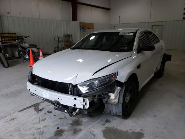 Photo 1 VIN: 1FAHP2MTXJG115881 - FORD TAURUS POL 