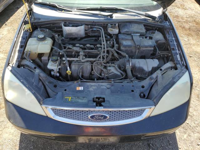 Photo 10 VIN: 1FAHP31N46W219520 - FORD FOCUS 