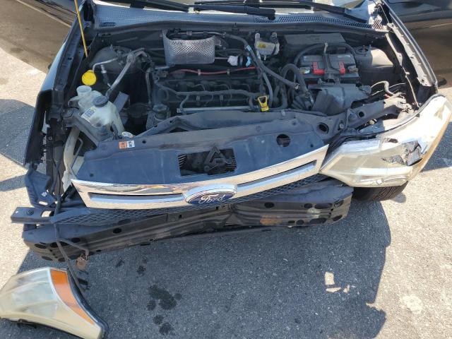 Photo 10 VIN: 1FAHP33N58W107129 - FORD FOCUS 