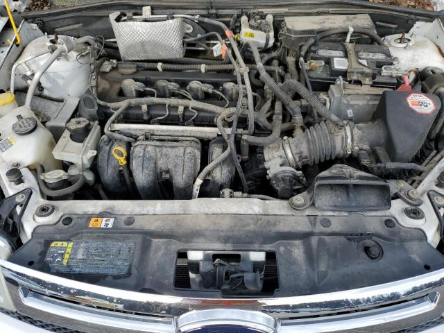 Photo 10 VIN: 1FAHP33N88W273323 - FORD FOCUS 