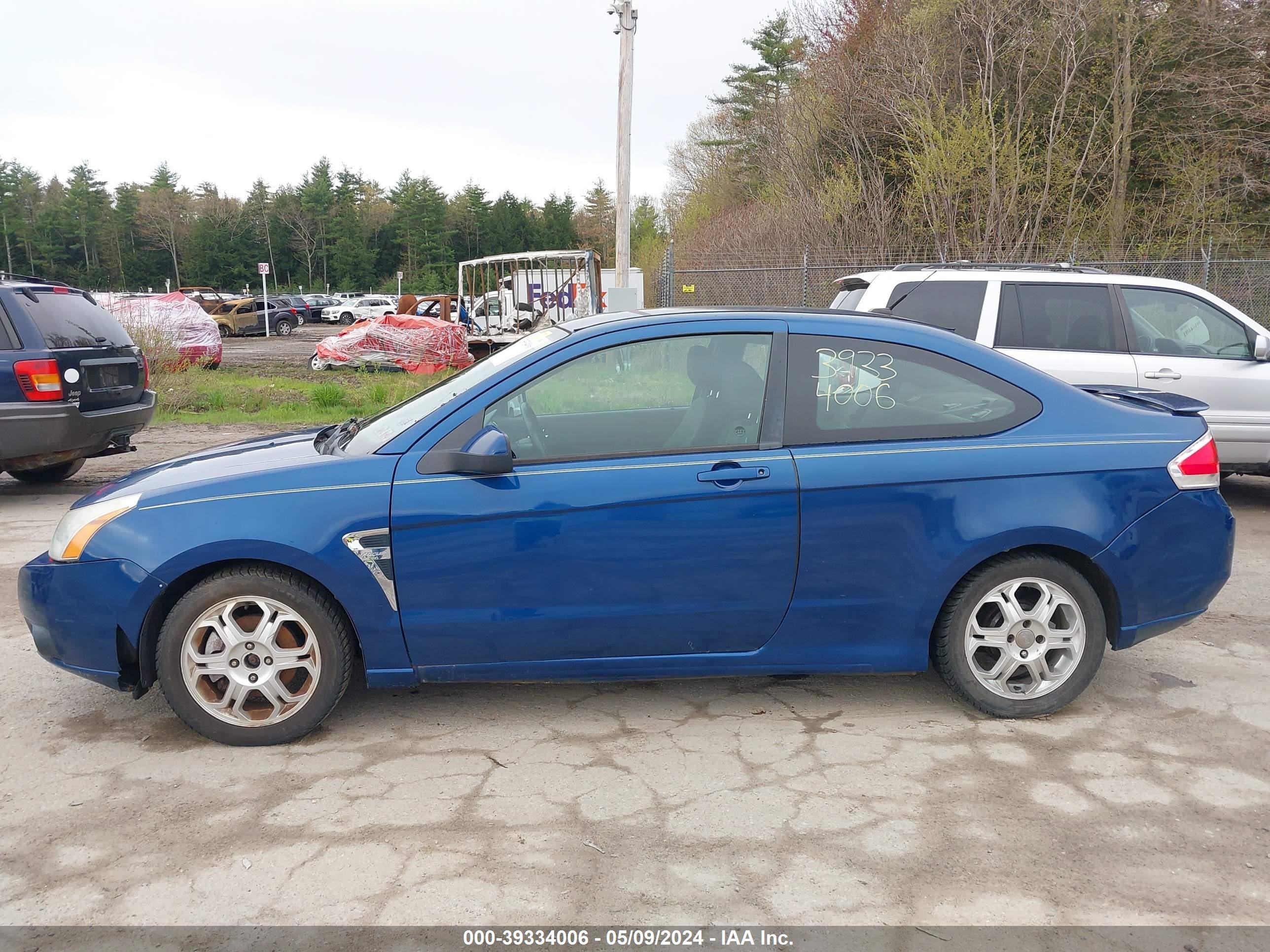 Photo 11 VIN: 1FAHP33N98W298103 - FORD FOCUS 