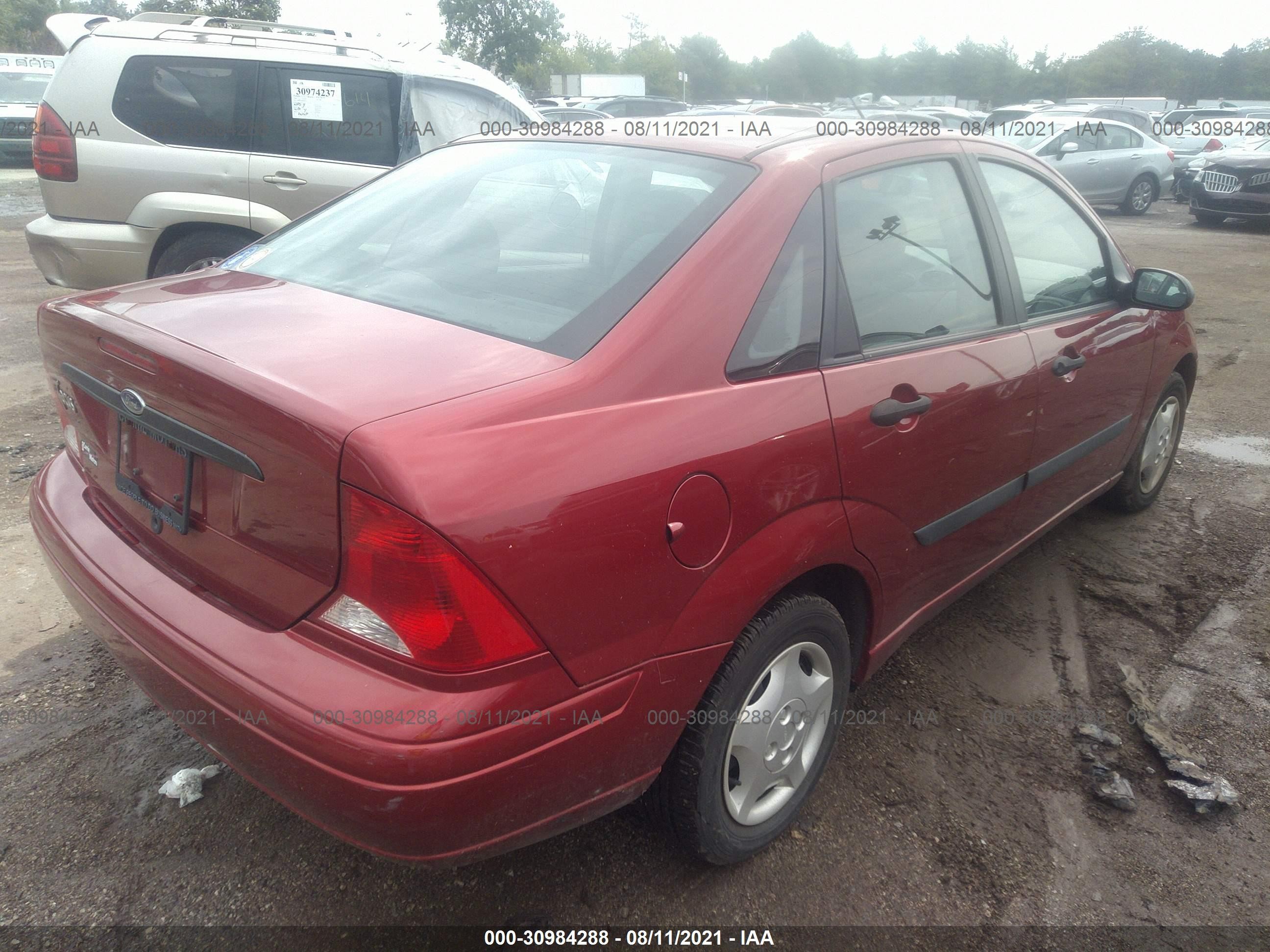 Photo 3 VIN: 1FAHP33P61W174443 - FORD FOCUS 