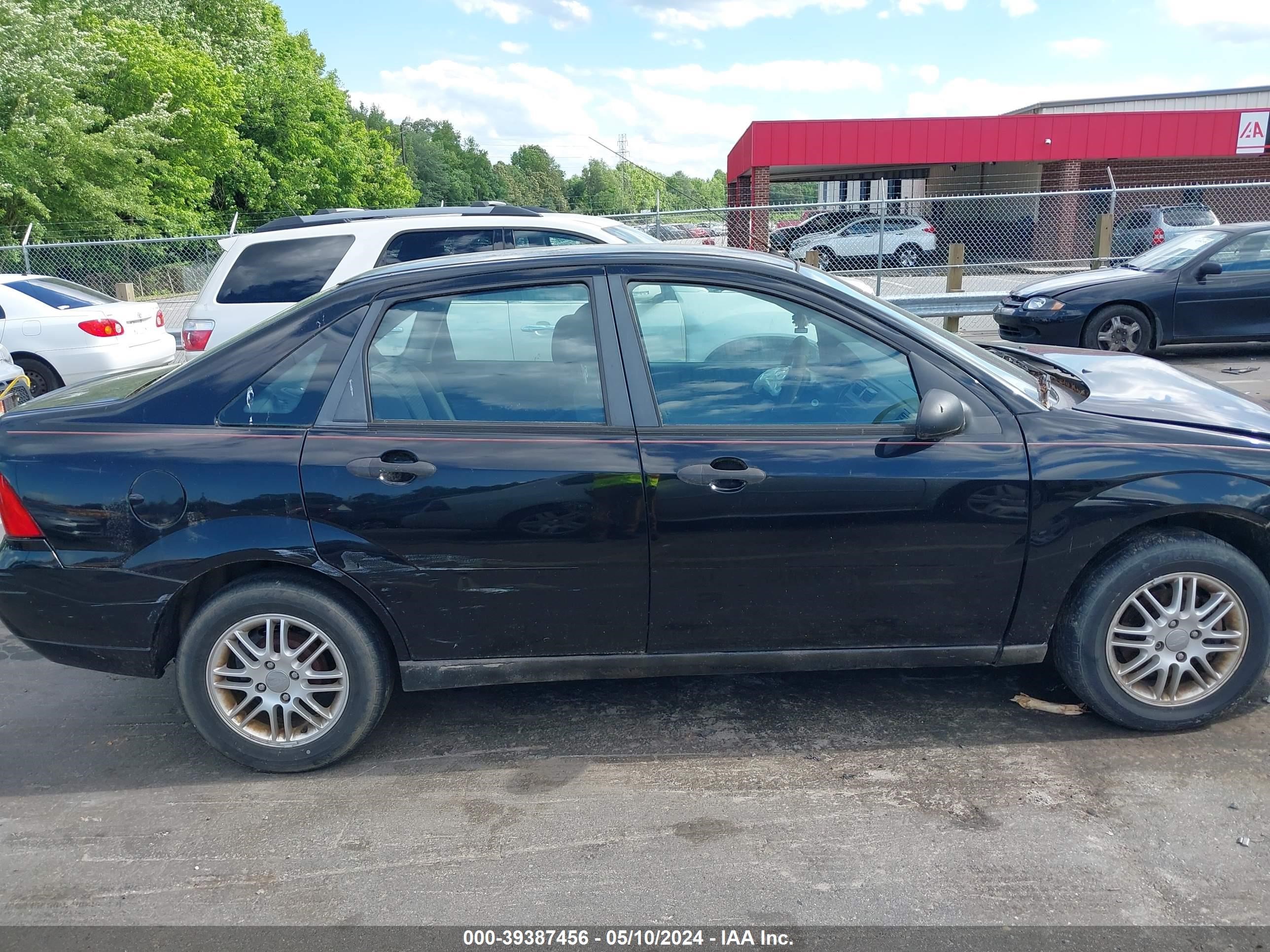 Photo 12 VIN: 1FAHP34N07W262507 - FORD FOCUS 