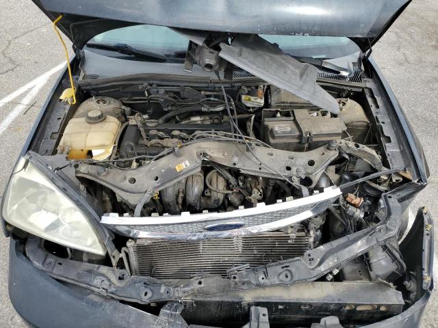 Photo 10 VIN: 1FAHP34N17W351244 - FORD FOCUS ZX4 