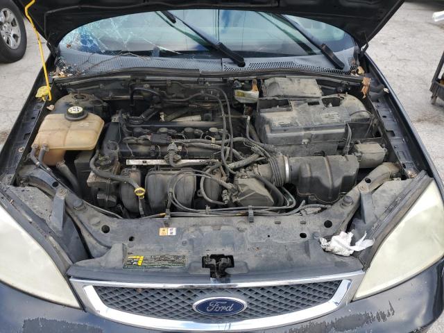 Photo 10 VIN: 1FAHP34N27W339331 - FORD FOCUS ZX4 