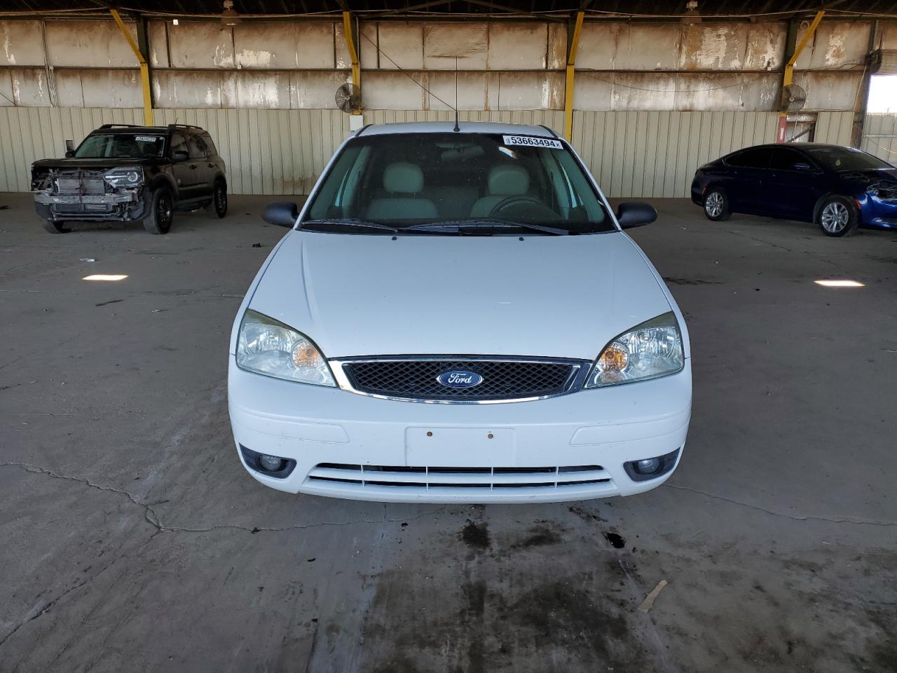 Photo 4 VIN: 1FAHP34N47W295753 - FORD FOCUS 