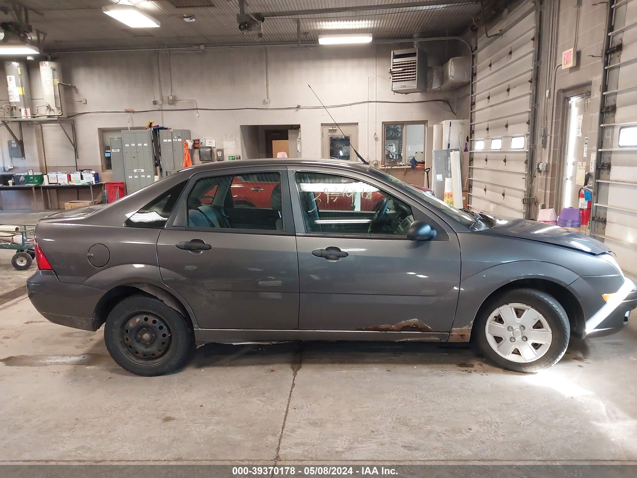 Photo 12 VIN: 1FAHP34N77W208198 - FORD FOCUS 