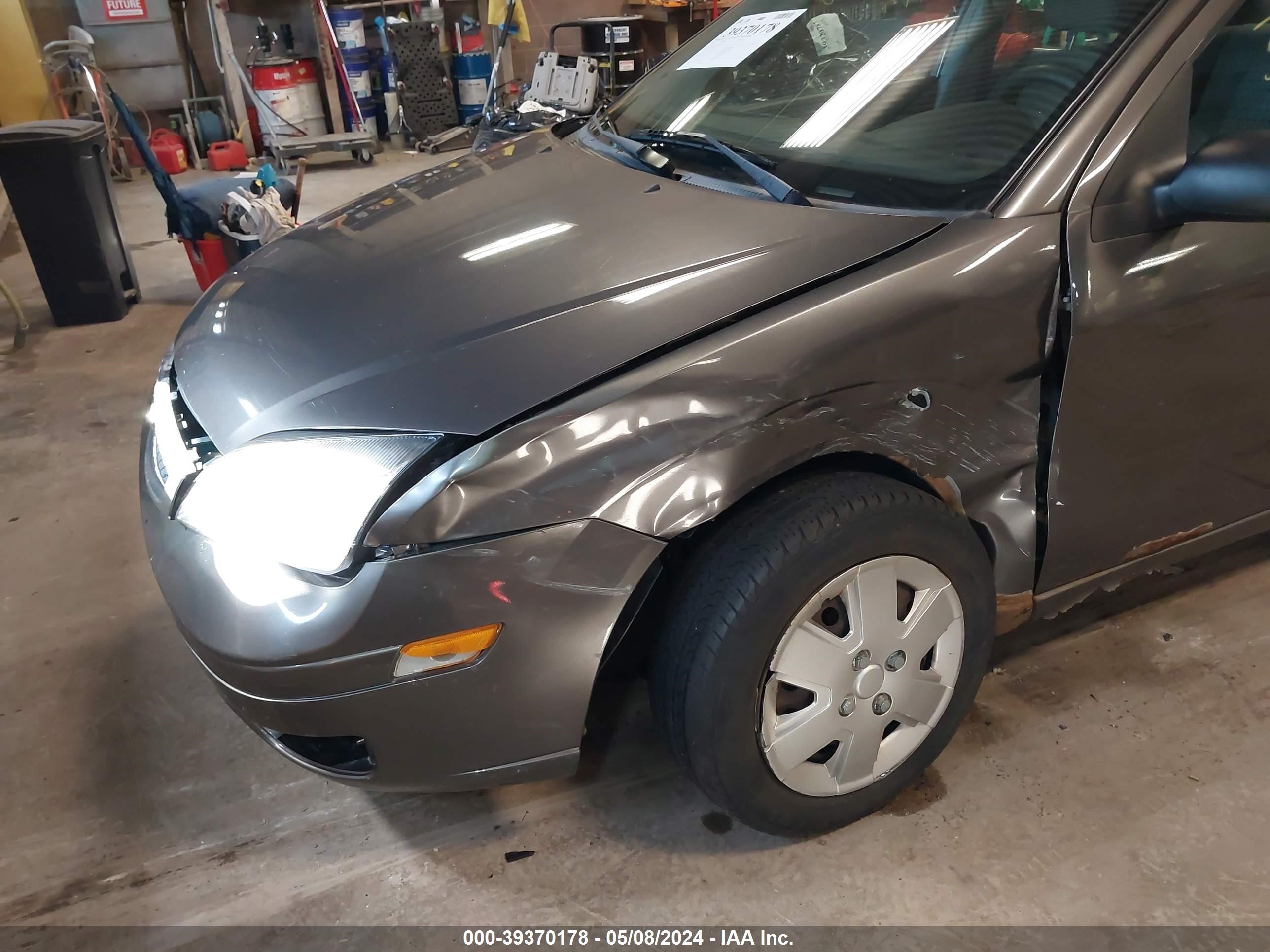 Photo 5 VIN: 1FAHP34N77W208198 - FORD FOCUS 