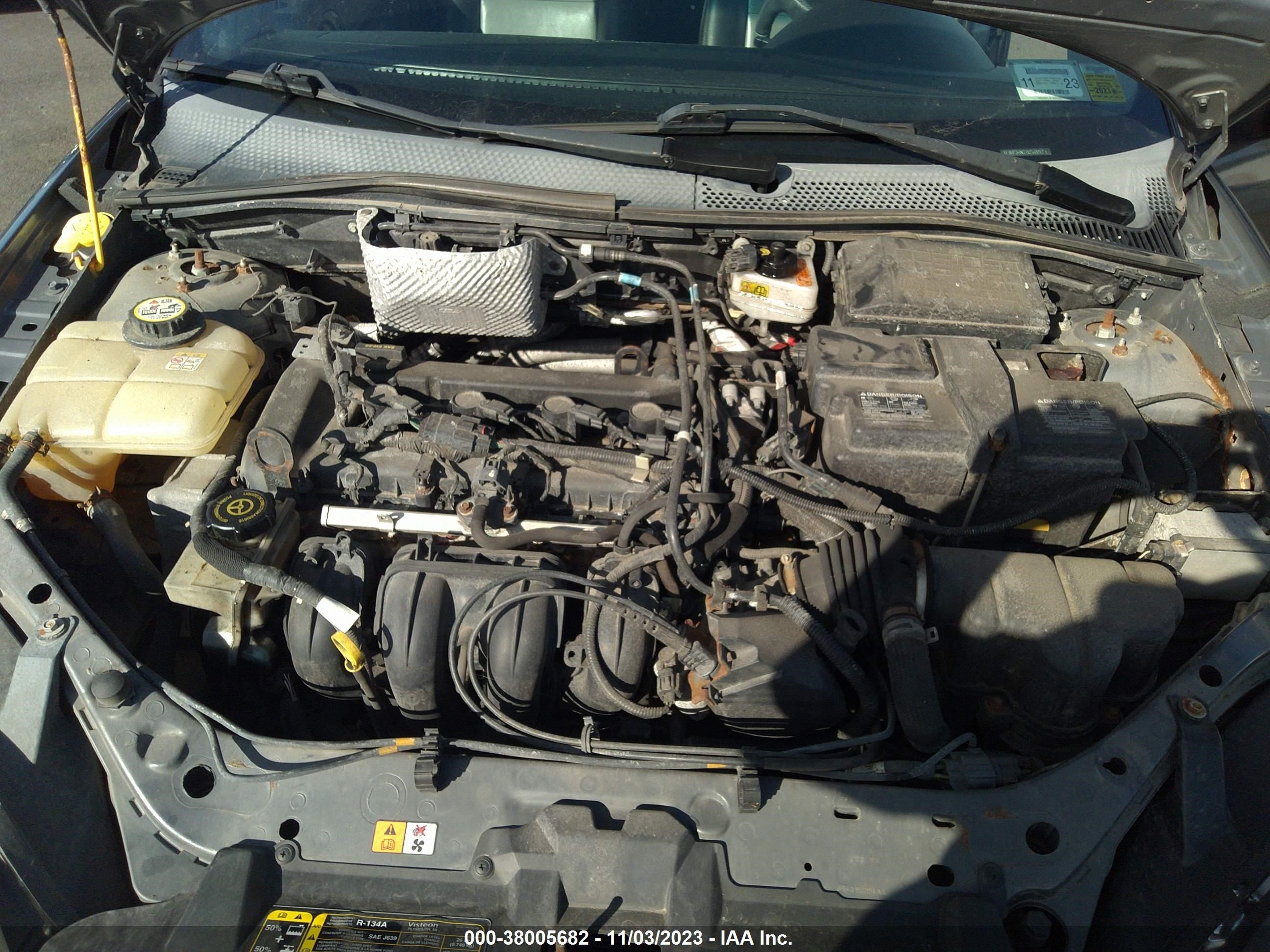 Photo 9 VIN: 1FAHP34N77W260012 - FORD FOCUS 