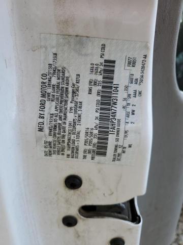 Photo 11 VIN: 1FAHP34N77W311041 - FORD FOCUS 