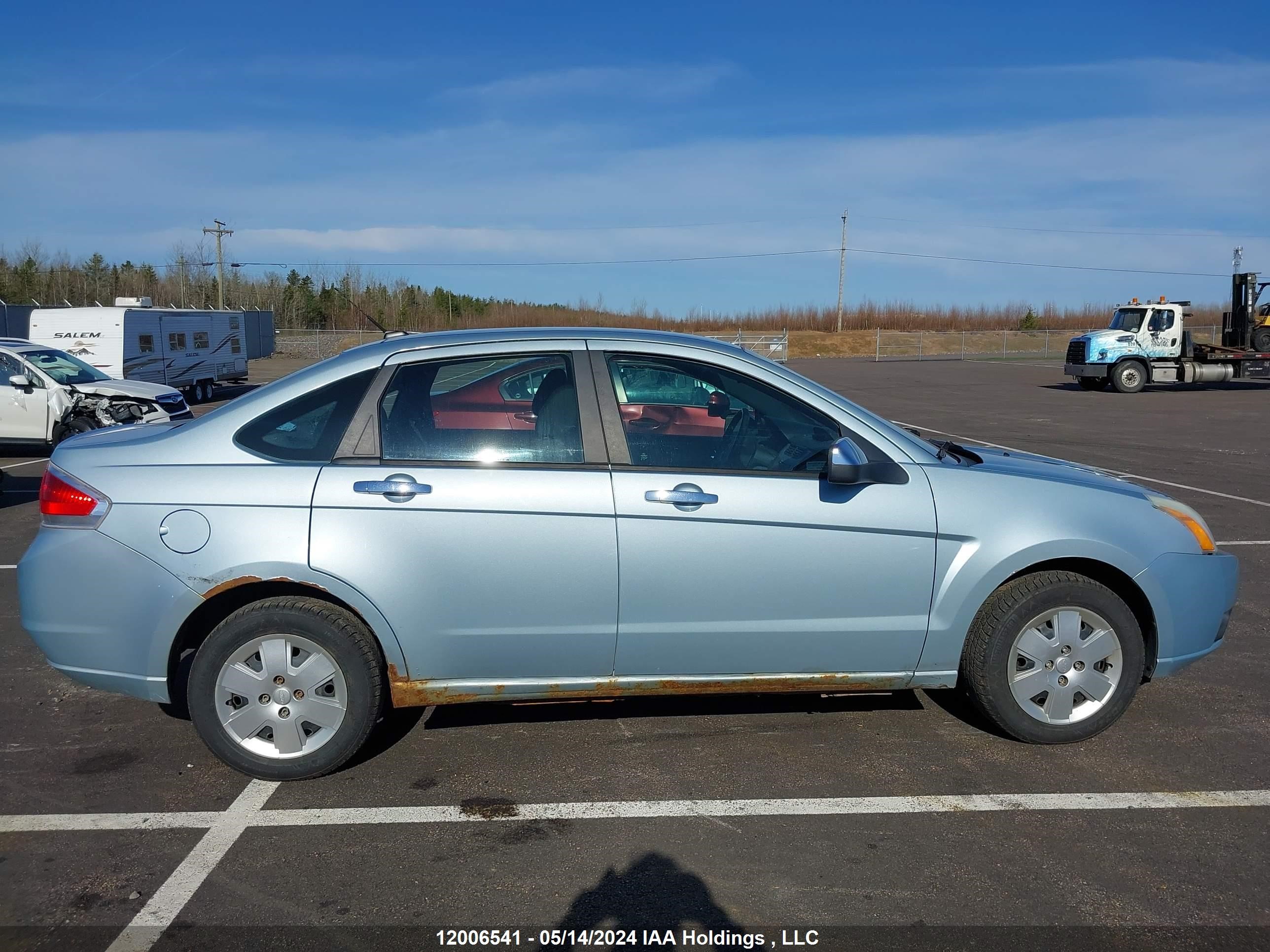 Photo 12 VIN: 1FAHP35N39W256492 - FORD FOCUS 