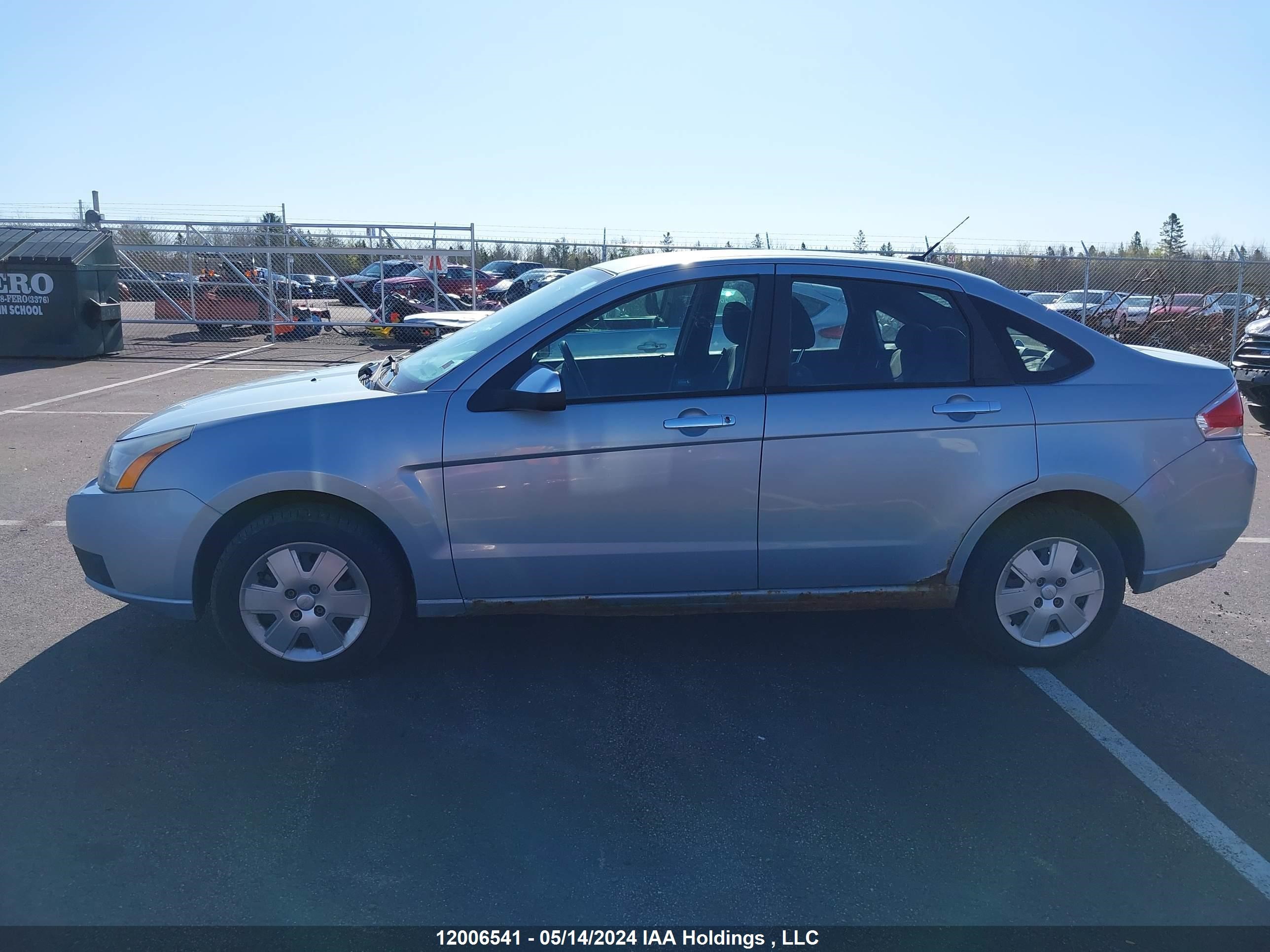 Photo 13 VIN: 1FAHP35N39W256492 - FORD FOCUS 