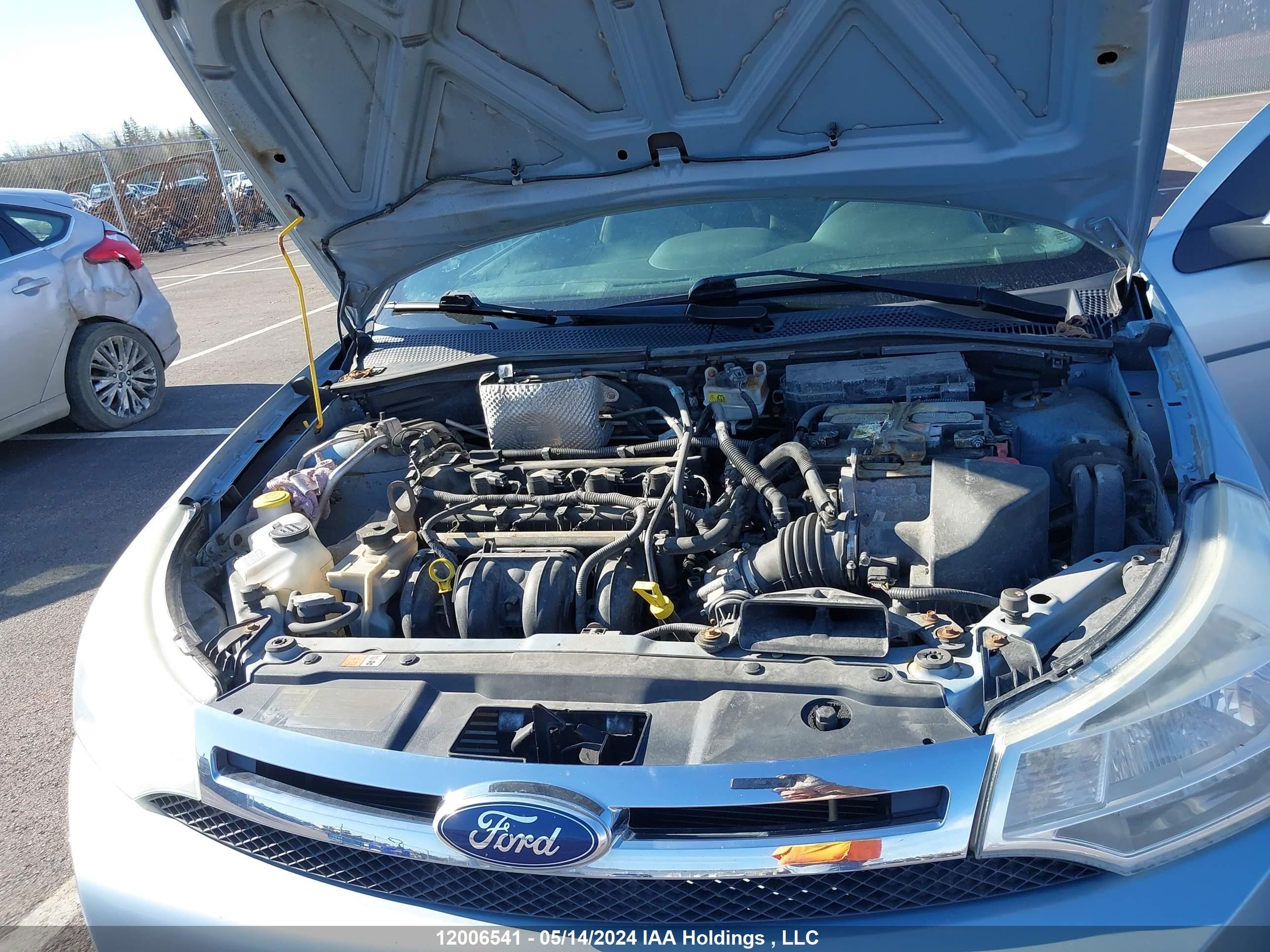 Photo 9 VIN: 1FAHP35N39W256492 - FORD FOCUS 