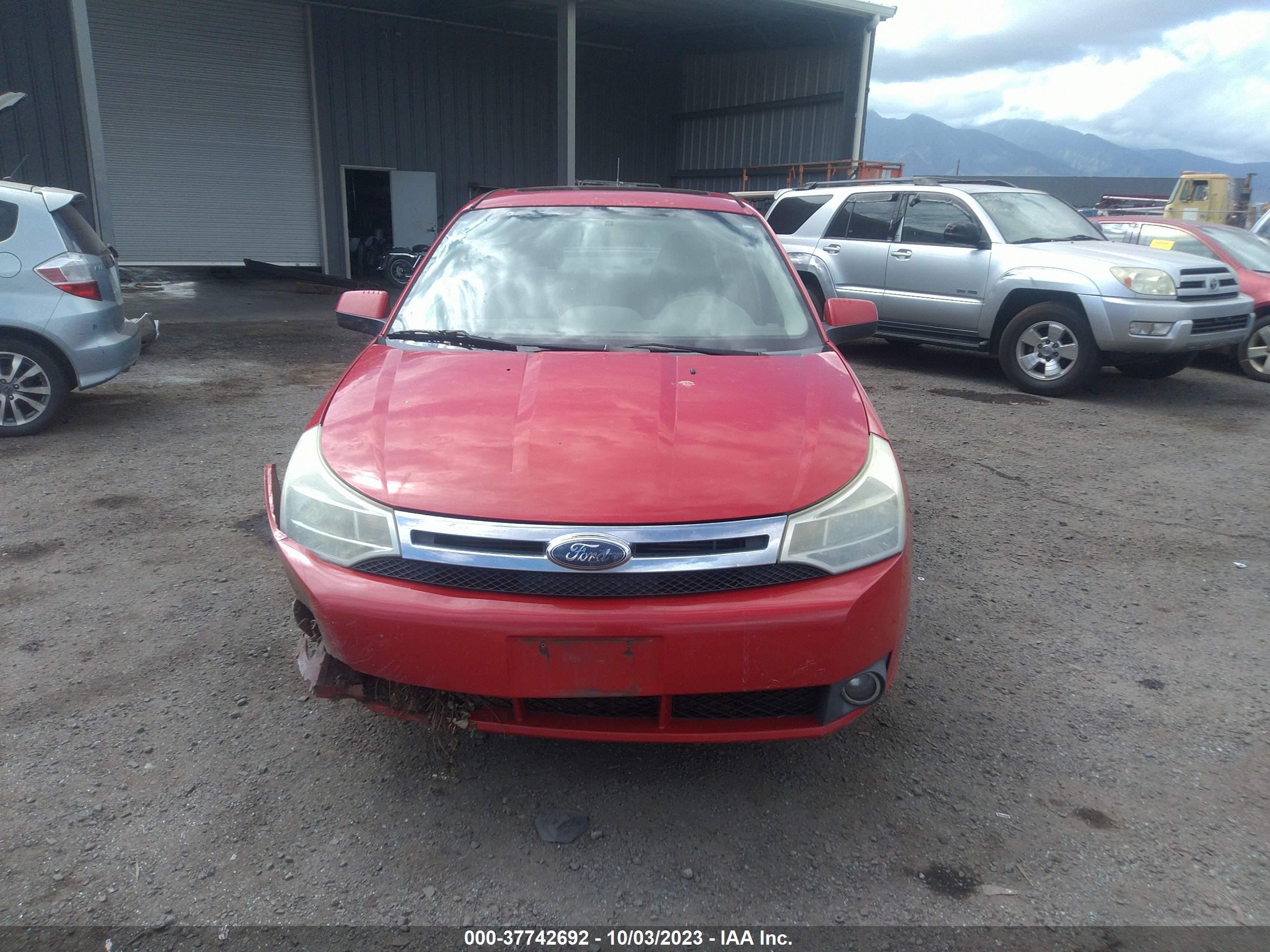 Photo 11 VIN: 1FAHP35N48W149210 - FORD FOCUS 