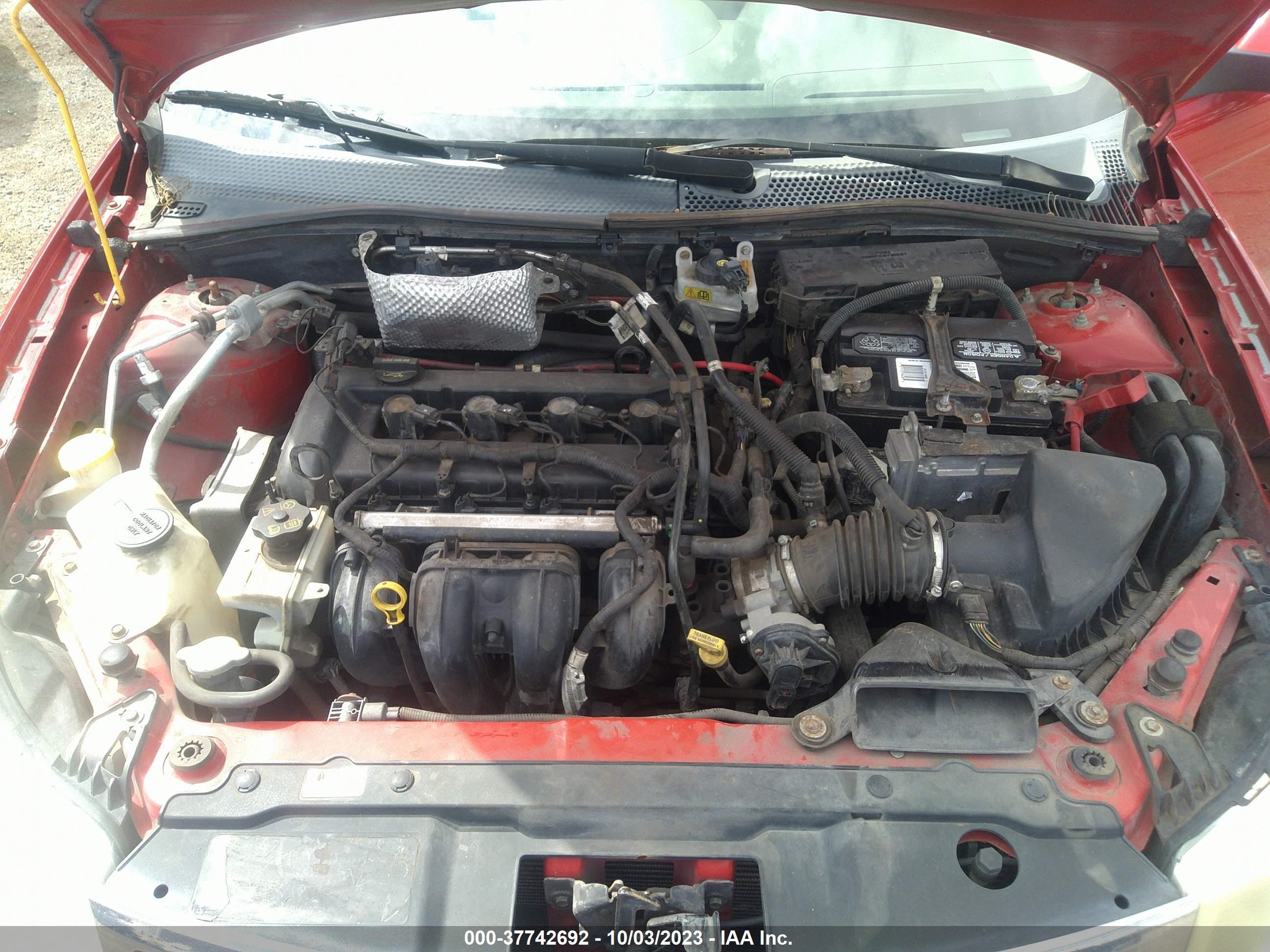 Photo 9 VIN: 1FAHP35N48W149210 - FORD FOCUS 