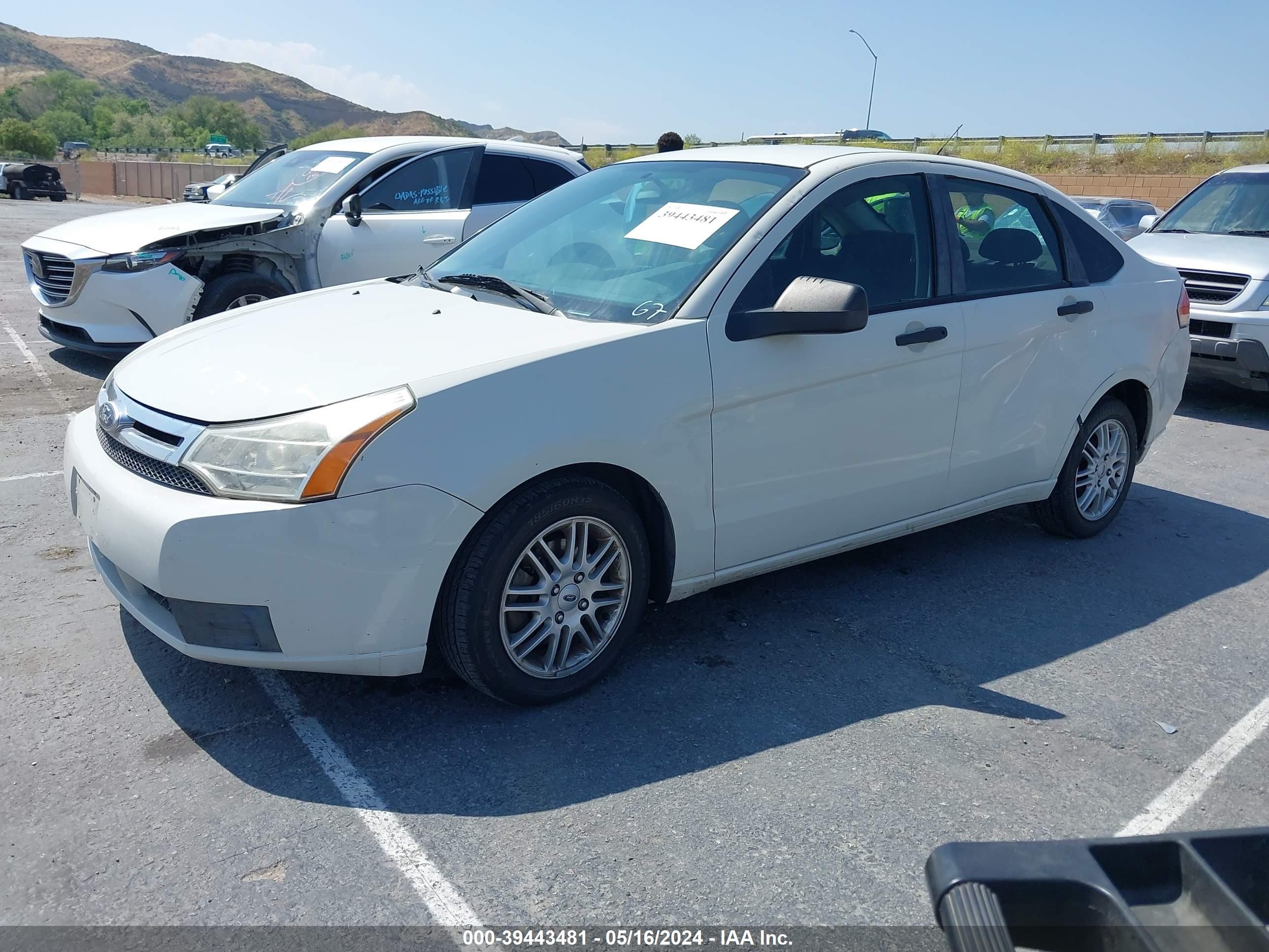 Photo 1 VIN: 1FAHP35N49W133929 - FORD FOCUS 