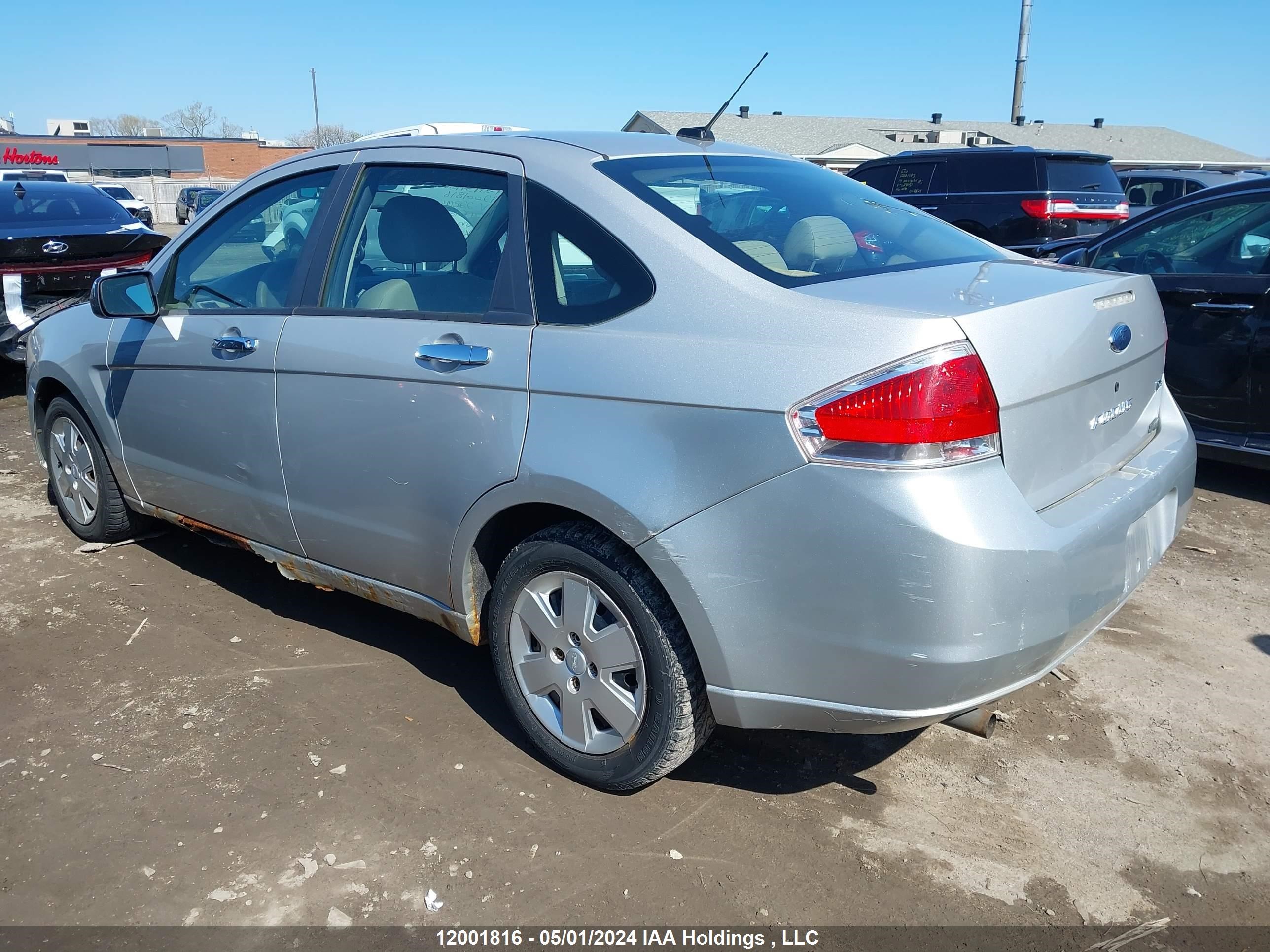 Photo 2 VIN: 1FAHP35N49W228961 - FORD FOCUS 