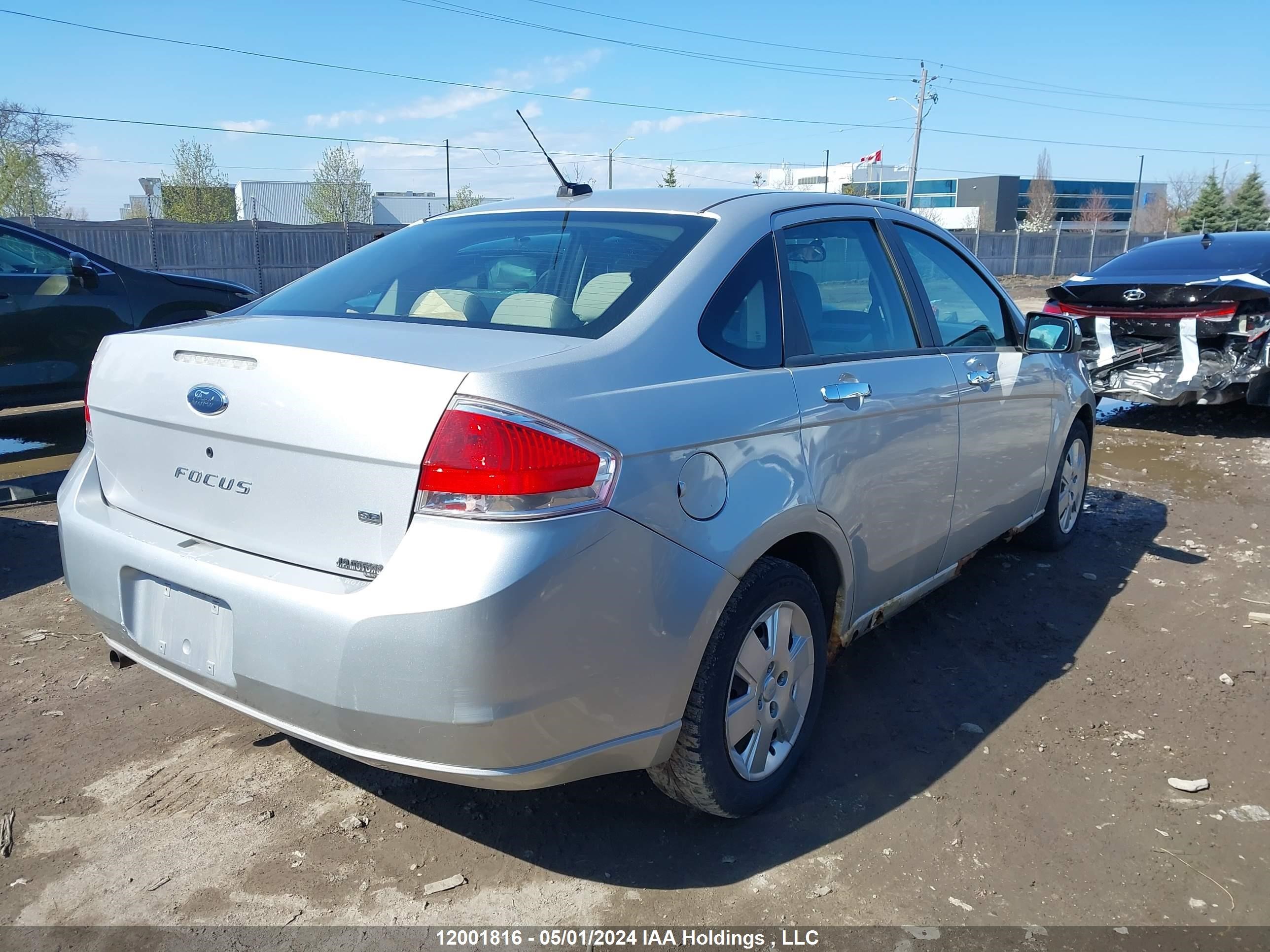 Photo 3 VIN: 1FAHP35N49W228961 - FORD FOCUS 