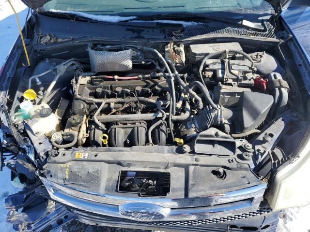 Photo 10 VIN: 1FAHP35N79W223561 - FORD FOCUS 