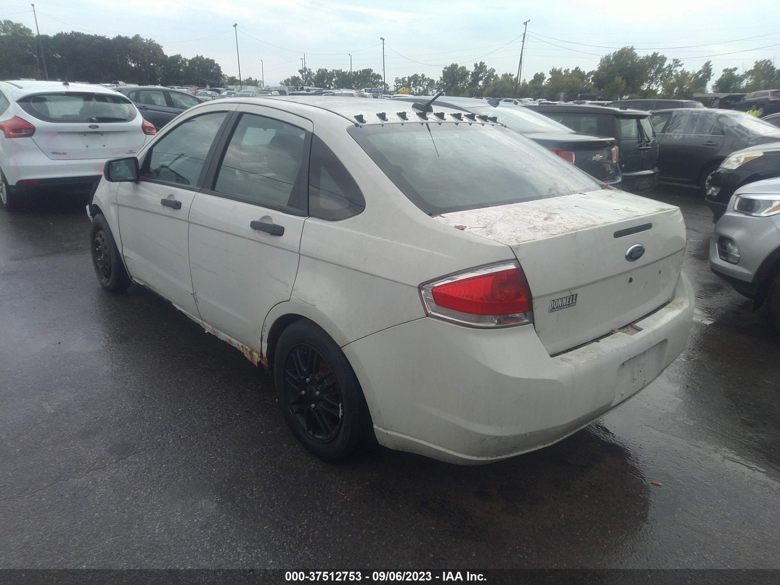 Photo 2 VIN: 1FAHP35N99W257906 - FORD FOCUS 