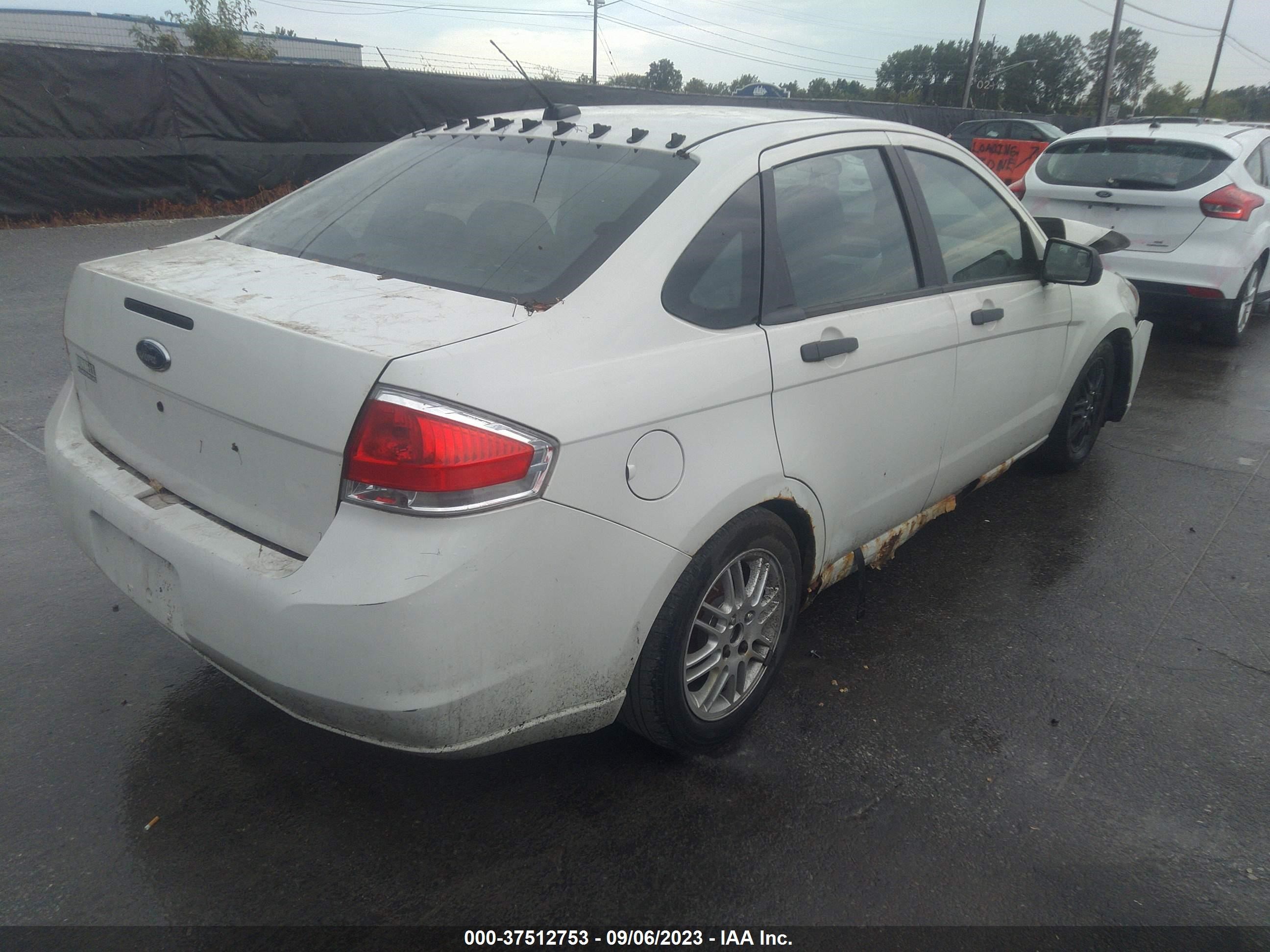 Photo 3 VIN: 1FAHP35N99W257906 - FORD FOCUS 