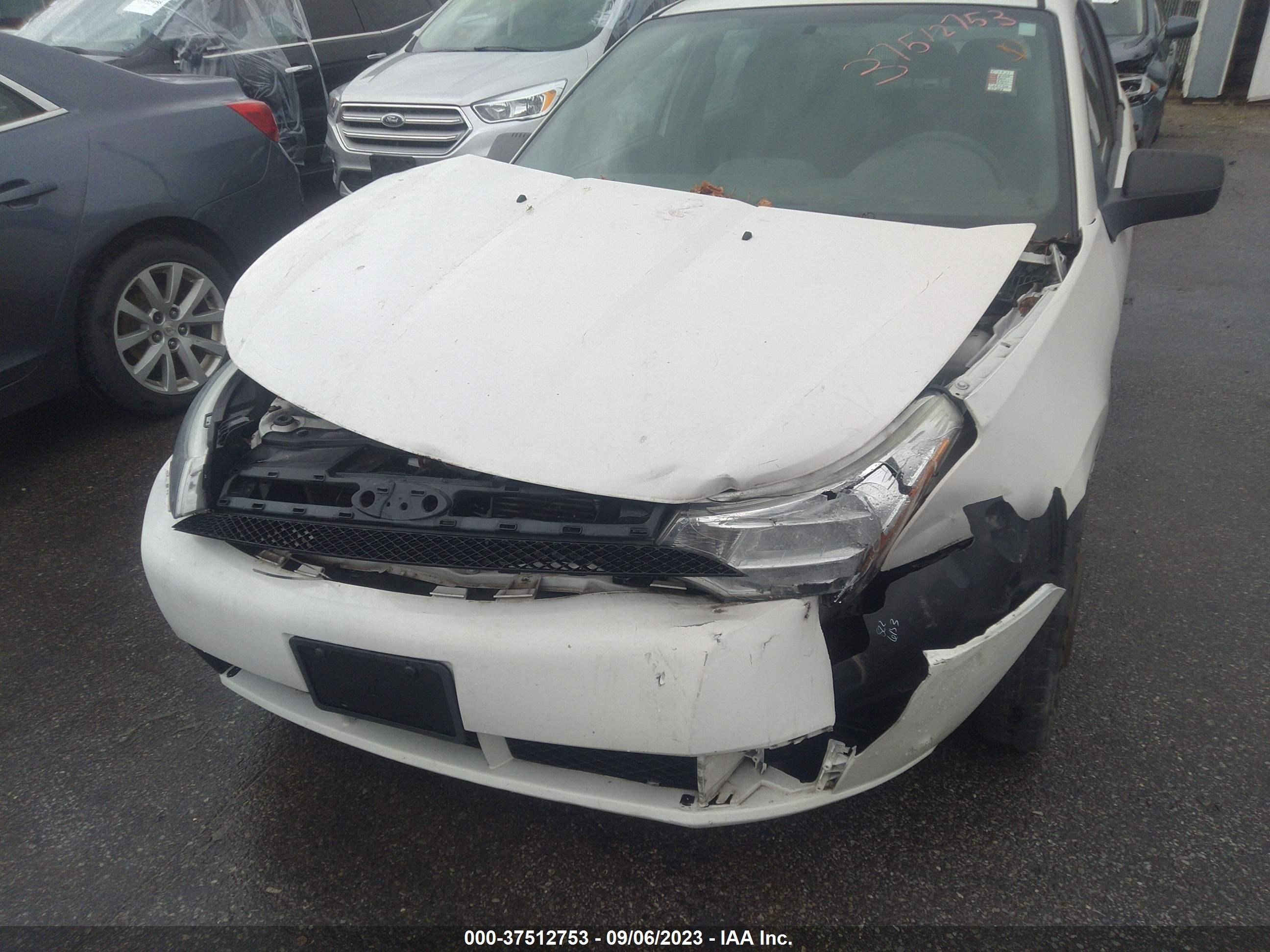 Photo 5 VIN: 1FAHP35N99W257906 - FORD FOCUS 