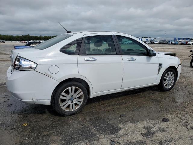 Photo 2 VIN: 1FAHP35NX8W201942 - FORD FOCUS 