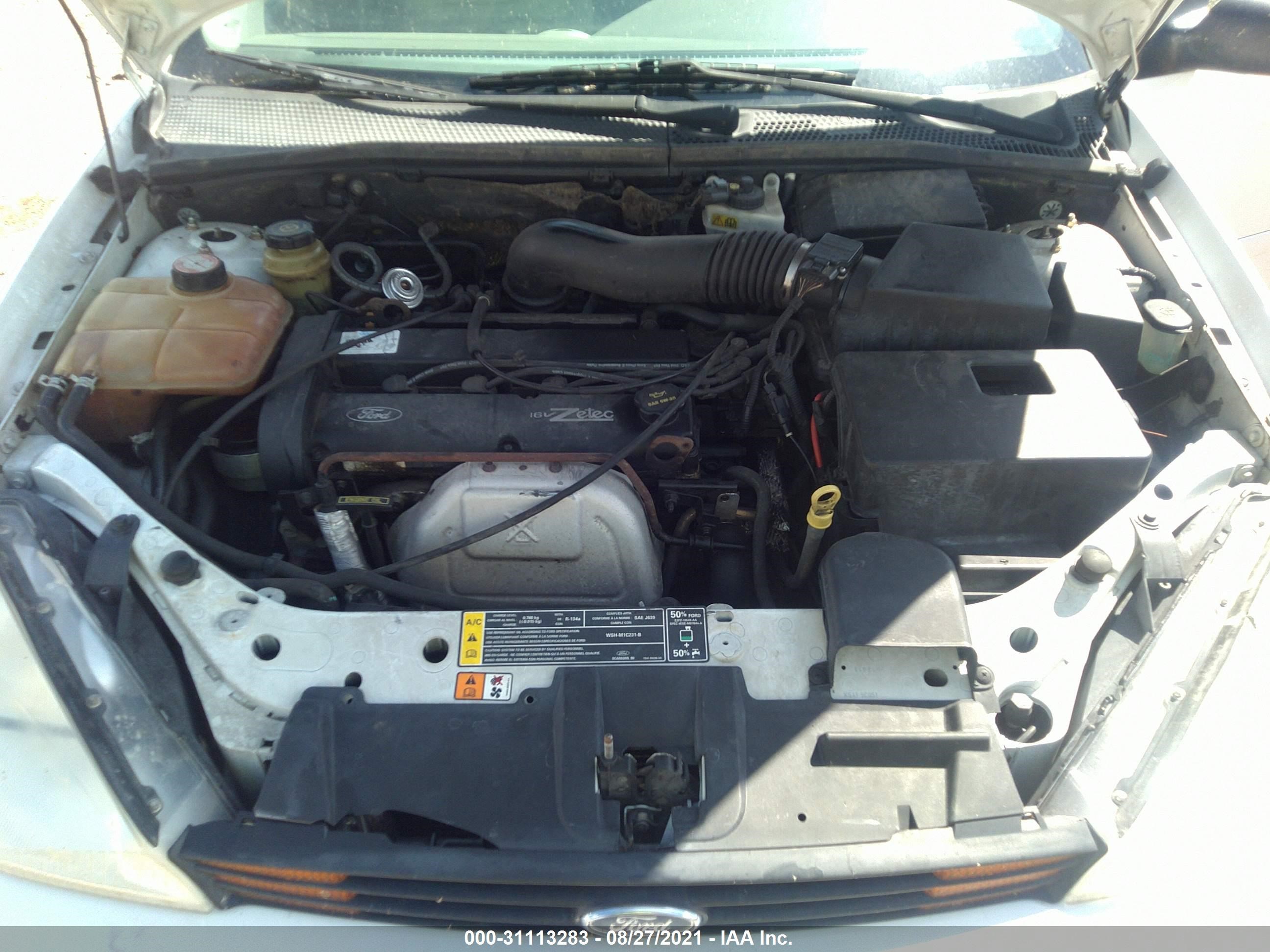 Photo 9 VIN: 1FAHP36341W151896 - FORD FOCUS 