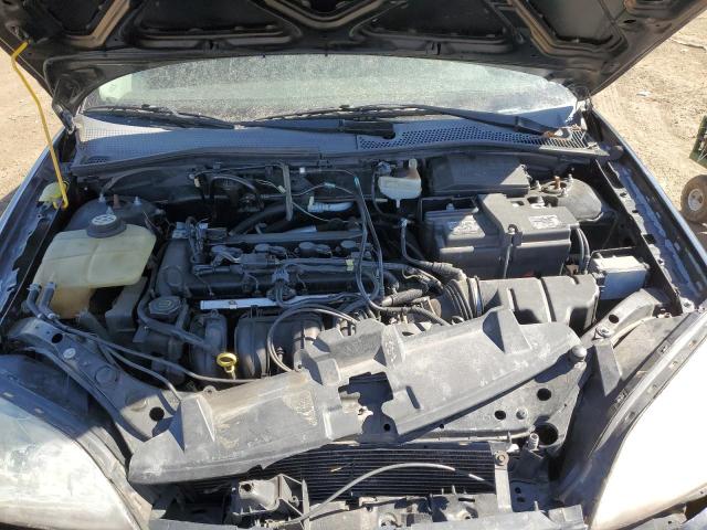 Photo 10 VIN: 1FAHP37N77W295449 - FORD FOCUS 