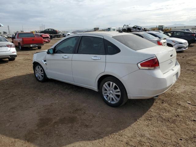 Photo 1 VIN: 1FAHP37NX9W125718 - FORD FOCUS 