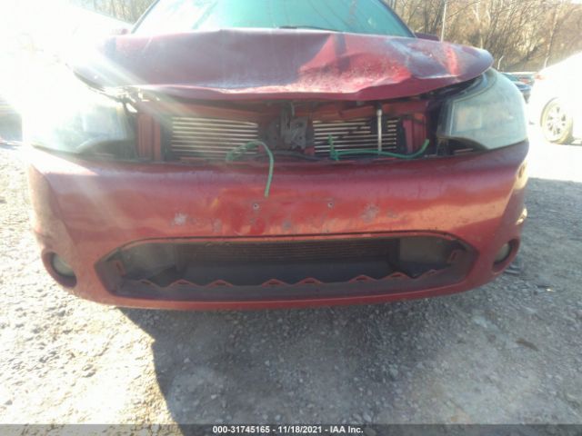 Photo 5 VIN: 1FAHP3CN1AW261407 - FORD FOCUS 