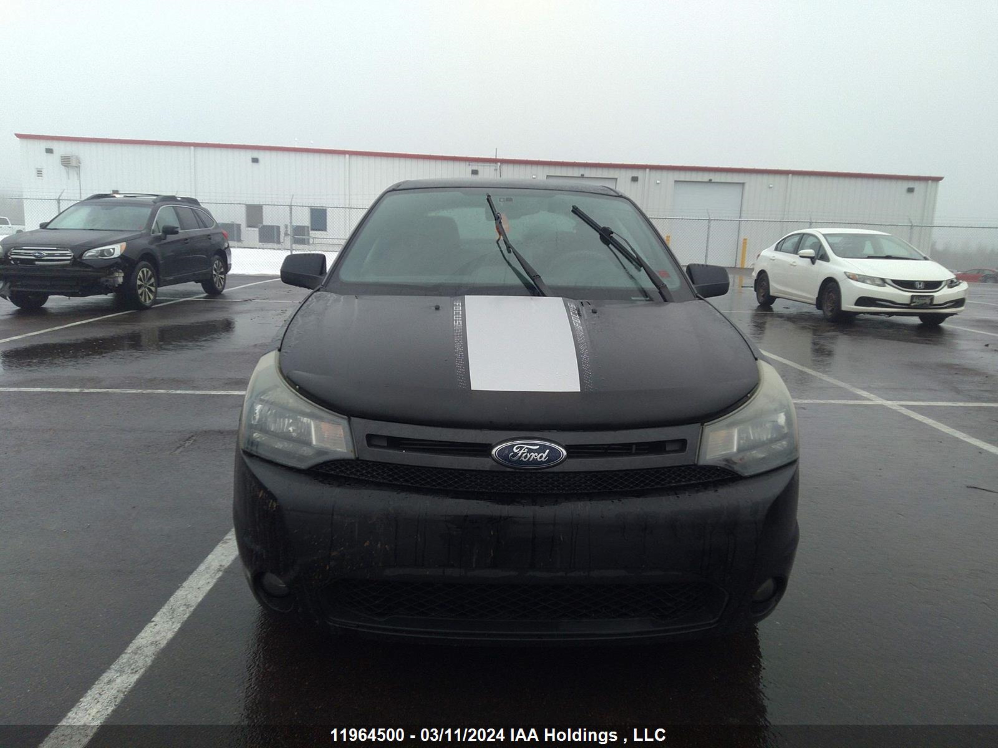 Photo 11 VIN: 1FAHP3CNXAW110520 - FORD FOCUS 