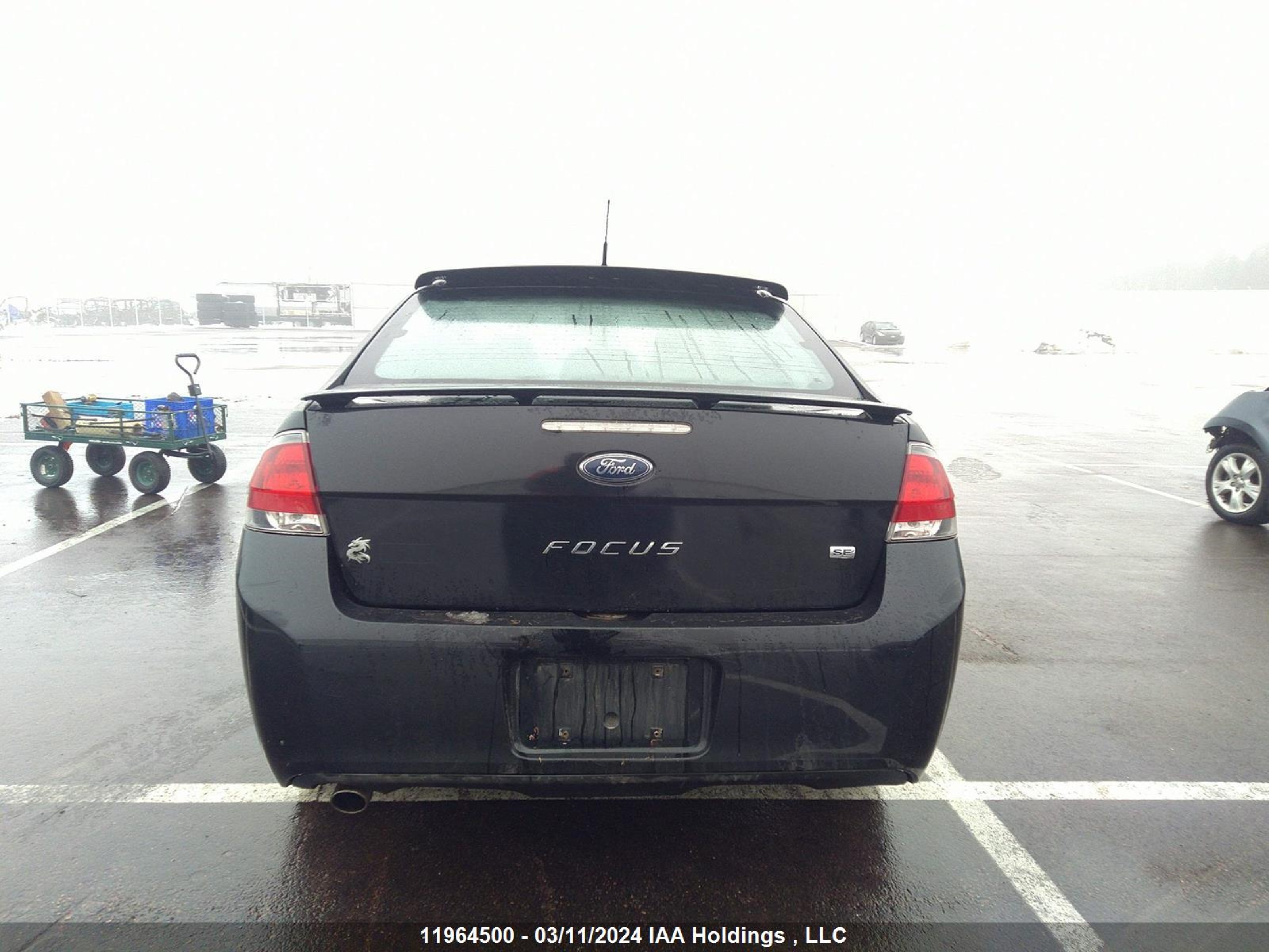 Photo 15 VIN: 1FAHP3CNXAW110520 - FORD FOCUS 