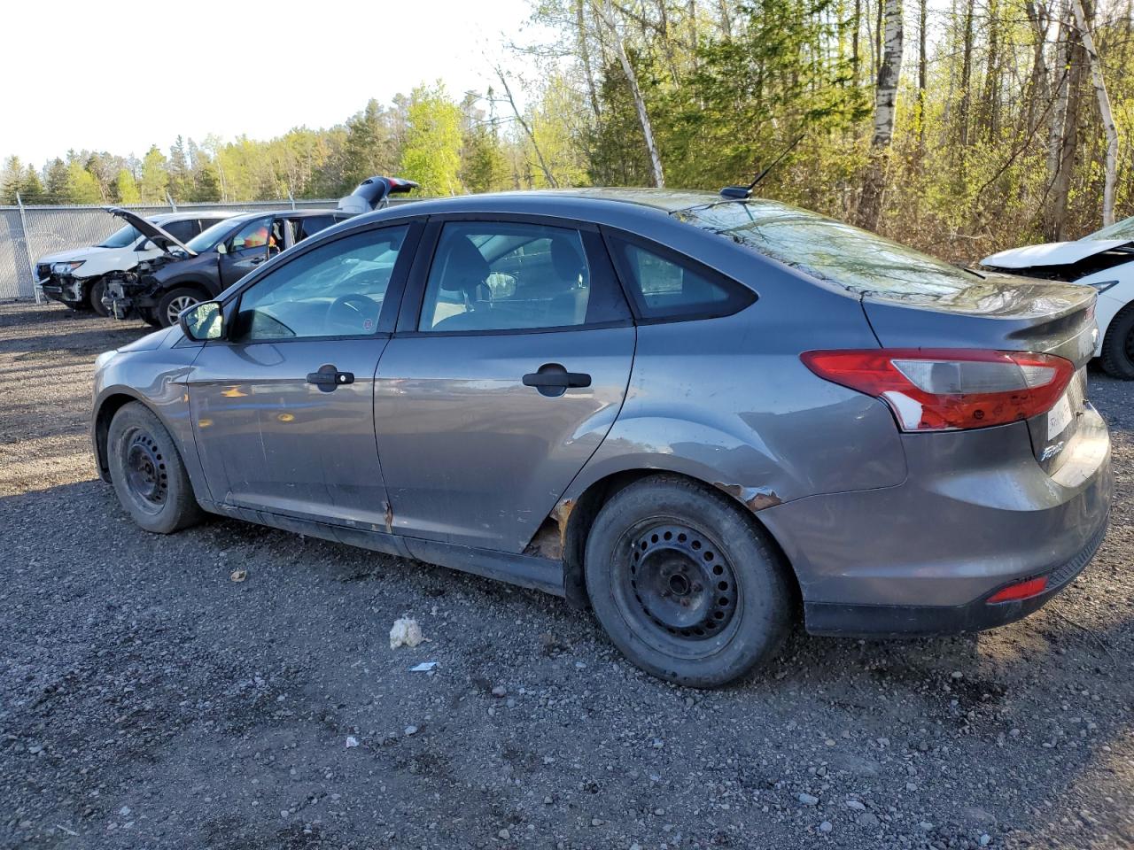 Photo 1 VIN: 1FAHP3E25CL228742 - FORD FOCUS 