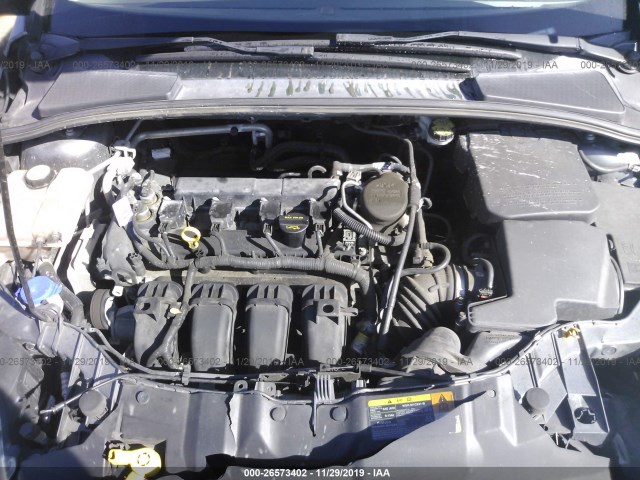 Photo 9 VIN: 1FAHP3E25CL370184 - FORD FOCUS 