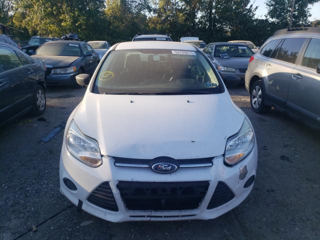 Photo 8 VIN: 1FAHP3E25CL408304 - FORD FOCUS S 