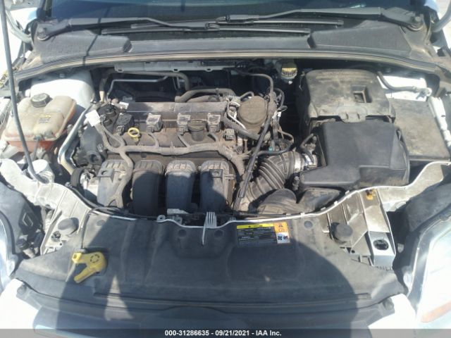 Photo 9 VIN: 1FAHP3E26CL174187 - FORD FOCUS 