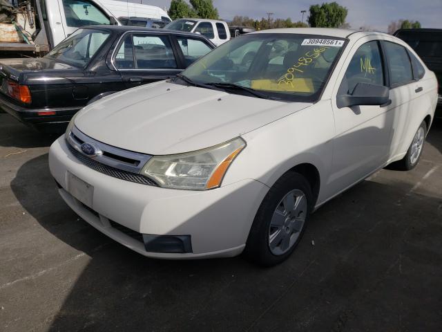 Photo 1 VIN: 1FAHP3EN0BW202945 - FORD FOCUS S 