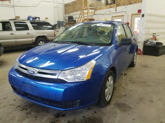 Photo 1 VIN: 1FAHP3ENXAW262682 - FORD FOCUS S 