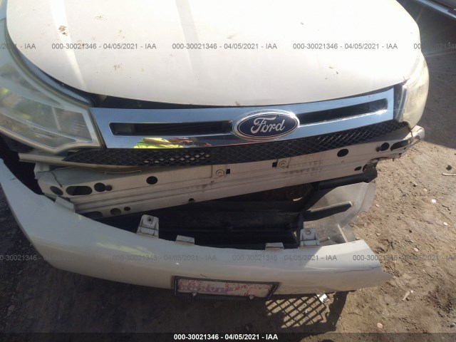 Photo 5 VIN: 1FAHP3ENXBW141247 - FORD FOCUS 