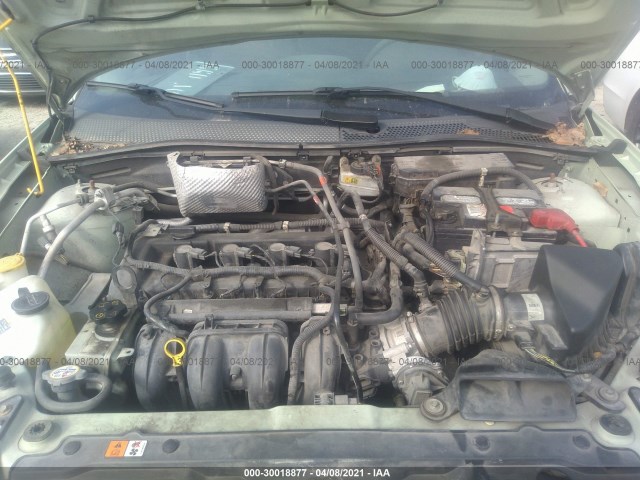 Photo 9 VIN: 1FAHP3ENXBW150272 - FORD FOCUS 