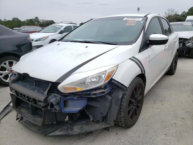 Photo 1 VIN: 1FAHP3F20CL140941 - FORD FOCUS SE 