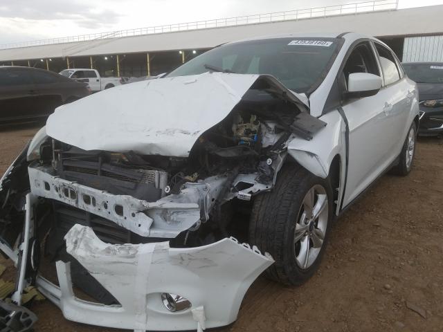 Photo 1 VIN: 1FAHP3F20CL164043 - FORD FOCUS SE 