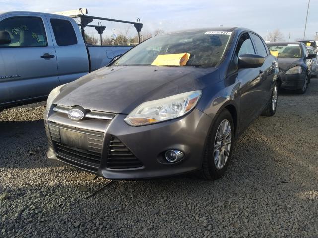 Photo 1 VIN: 1FAHP3F20CL178654 - FORD FOCUS SE 